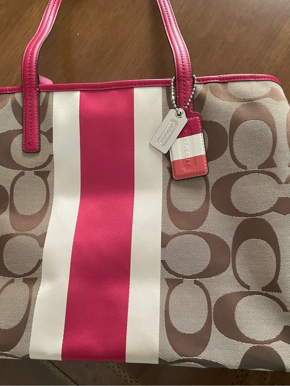 Coach Beige Signature Tote with Pink and Cream Center Stripe .New without tag
